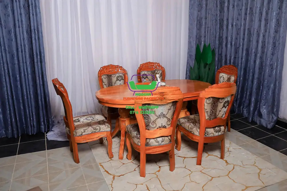 Oval Mahogany 6 seater dining set with Flower seats Mahogany