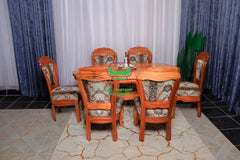 Oval Mahogany 6 seater dining set with Flower seats Mahogany